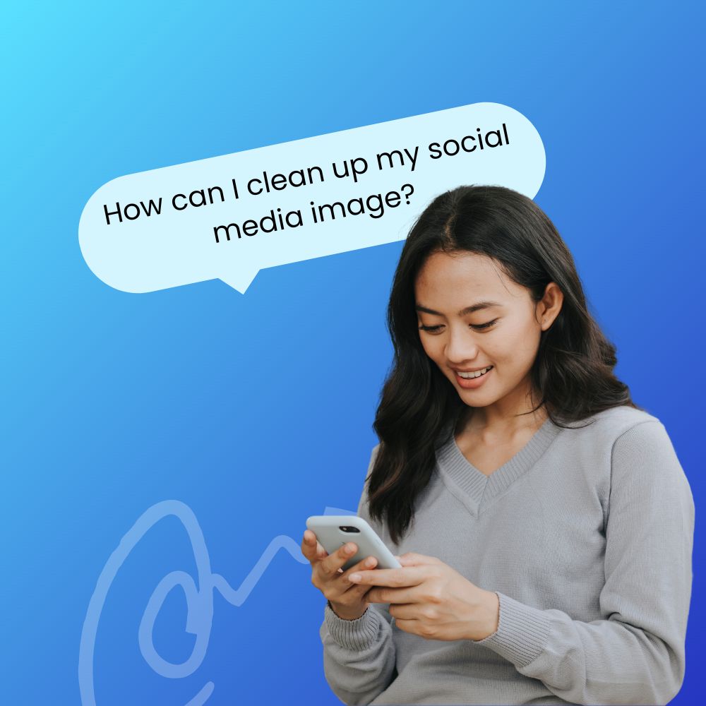 Young woman smiling while looking at her phone, with a text bubble above her asking, 'How can I clean up my social media image?' against a blue background.